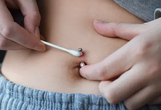 belly button piercing outie