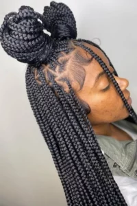 Knotless Braids Styled with Half Up, Half Down Space Buns